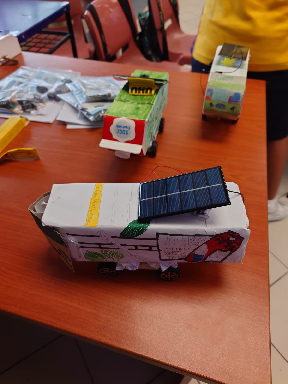 Student-built solar buses at the prototype stage during a Singapore primary school programme
