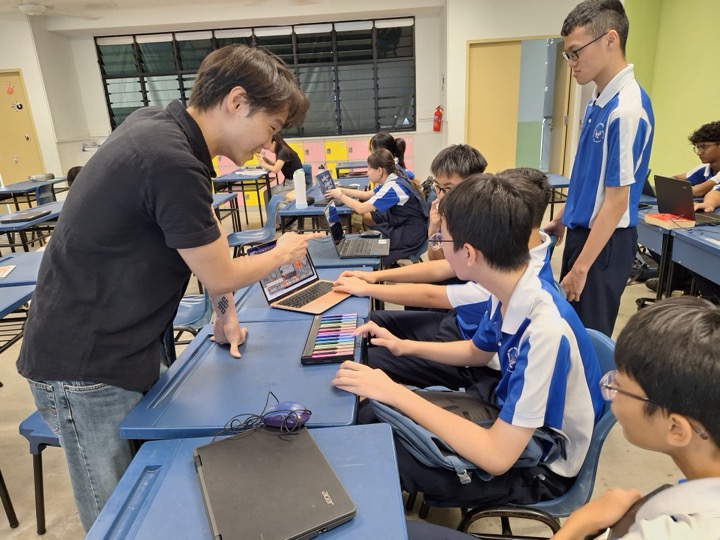 Industry expert engaging students through hands-on learning.